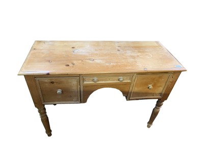 Lot 3163 - A pine dressing table, with three drawers, on...