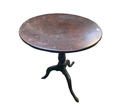 Lot 3182 - A mahogany tit top tripod table, 18th century,...