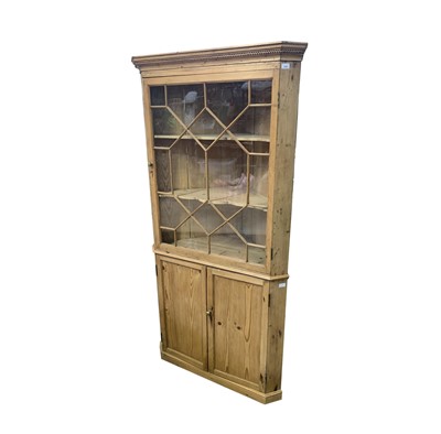 Lot 369 - A 19th century pine standing corner cupboard,...