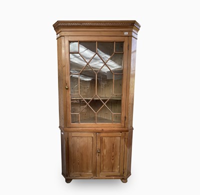 Lot 370 - A 19th century pine standing corner cupboard,...