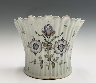 Lot 1035 - A French 18th century faience bulb or flower...