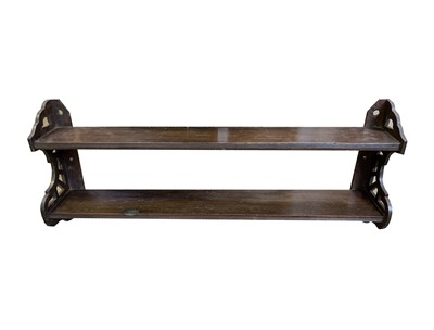 Lot 3186 - An Edwardian mahogany wall shelf, with fretcut...