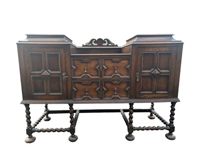 Lot 3187 - A Jacobean style oak sideboard, circa 1920,...