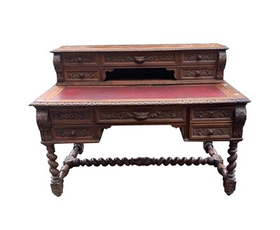 Lot 3188 - A Victorian carved oak writing table, circa...