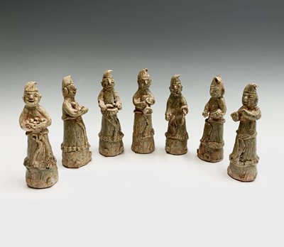 Lot 215 - Seven Chinese celadon pottery figures, height...