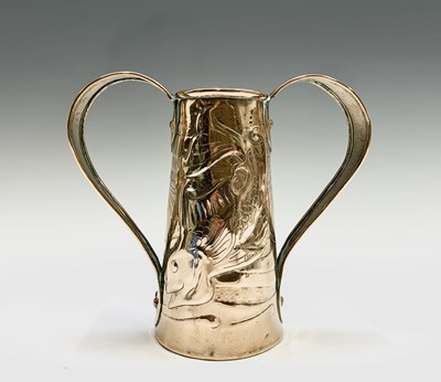 Lot 304 - A Newlyn brass twin handled vase, of tapered...