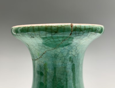Lot 71 - A Chinese green crackle glazed earthenware...