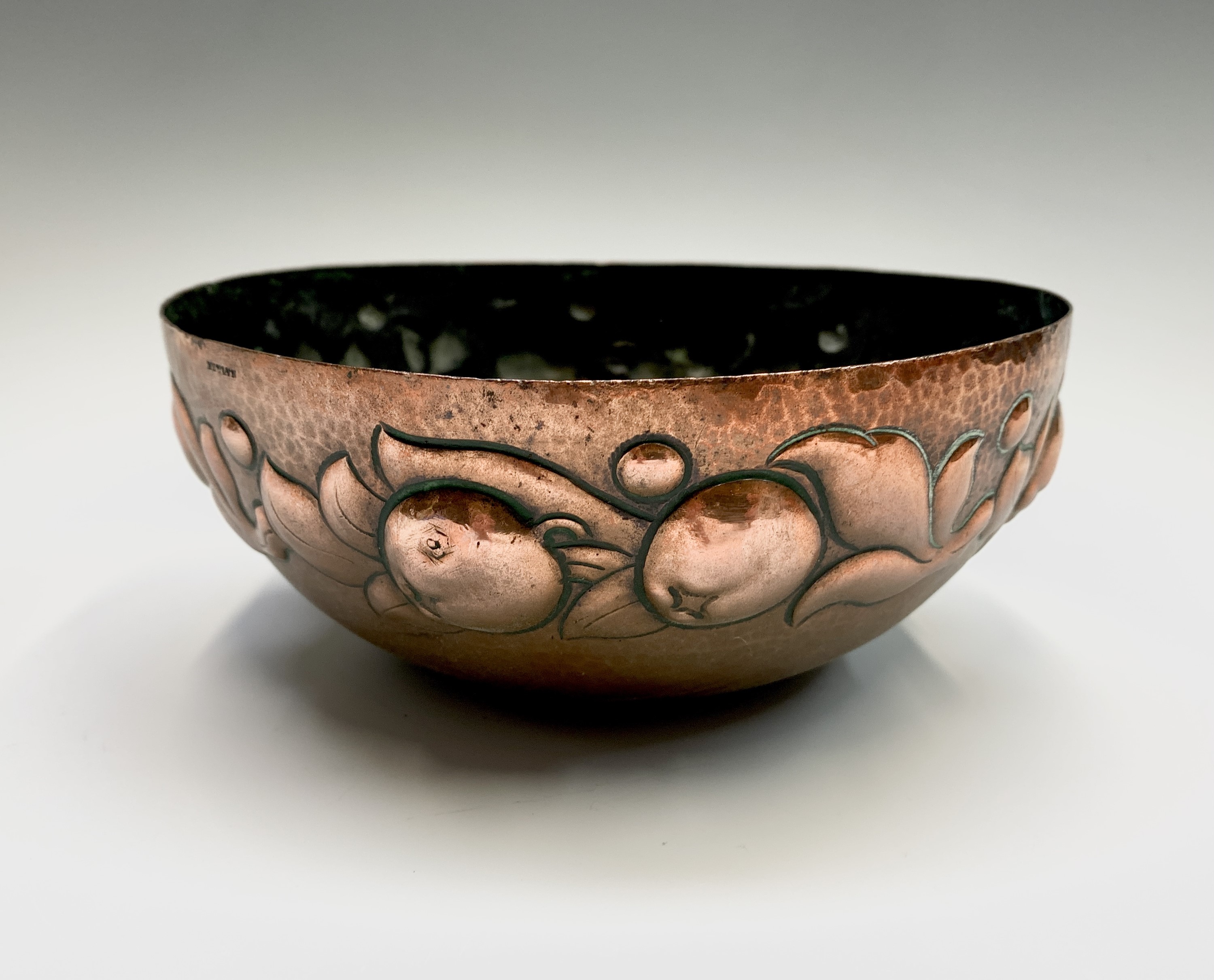 Lot 312 A Newlyn copper bowl, repousse decorated