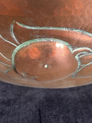 Lot 312 - A Newlyn copper bowl, repousse decorated with...