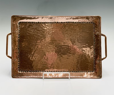 Lot 318 - An Arts and Crafts copper twin handled tray,...