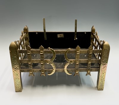 Lot 114 - A Gothic brass fire basket, 20th century, of...