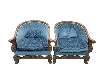 Lot 3200 - A pair of oak upholstered tub chairs, circa...