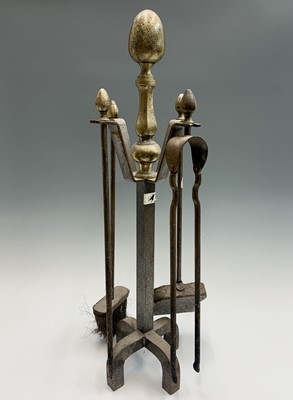 Lot 345 - A heavy cast brass and wrought iron Fireside...