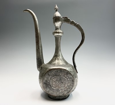 Lot 1064 - A Persian tinned copper ewer, 18th/19th...