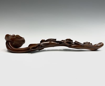 Lot 228 - A Chinese carved wood rui sceptre, length 29.5.