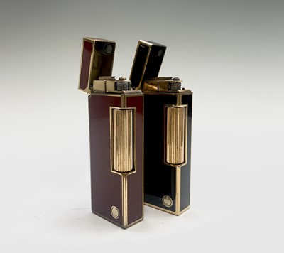 Lot 71 - Two Dunhill gold plated Rollagas lighters, one...