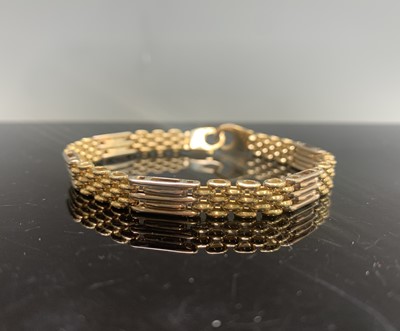 Lot 296 - An 18ct gold bracelet 25.6gm Length 21.5cm