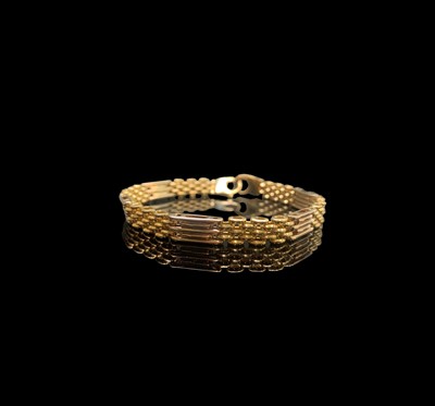 Lot 296 - An 18ct gold bracelet 25.6gm Length 21.5cm
