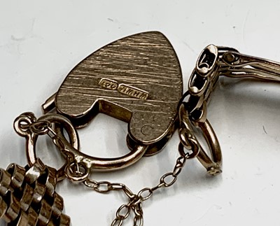 Lot 344 - A 9ct gold 4 bar link bracelet with padlock...