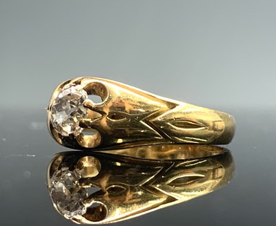 Lot 67 - An 18ct gold ring claw set with a bright oval...