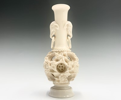 Lot 234 - A Chinese carved ivory puzzle ball vase, early...