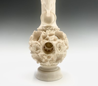 Lot 234 - A Chinese carved ivory puzzle ball vase, early...