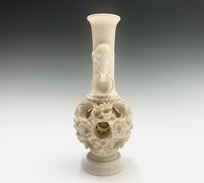 Lot 234 - A Chinese carved ivory puzzle ball vase, early...