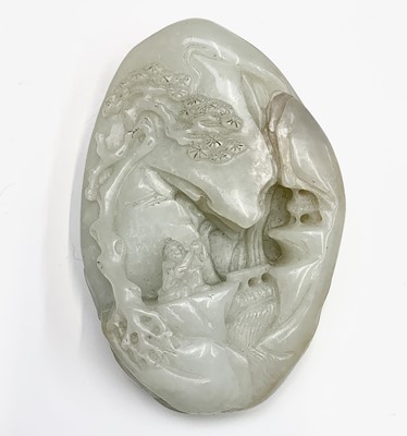Lot 25 - A Chinese pale celadon jade boulder, 18th/19th...