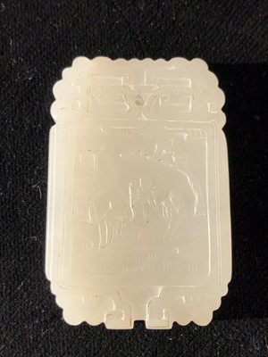 Lot 79 - A Chinese carved jade pendant, with figures in...