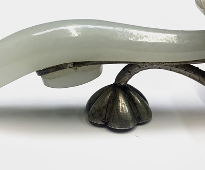 Lot 32 - A Chinese jade and silver spoon, the bowl in...