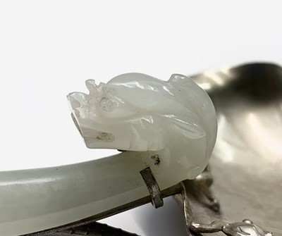 Lot 32 - A Chinese jade and silver spoon, the bowl in...