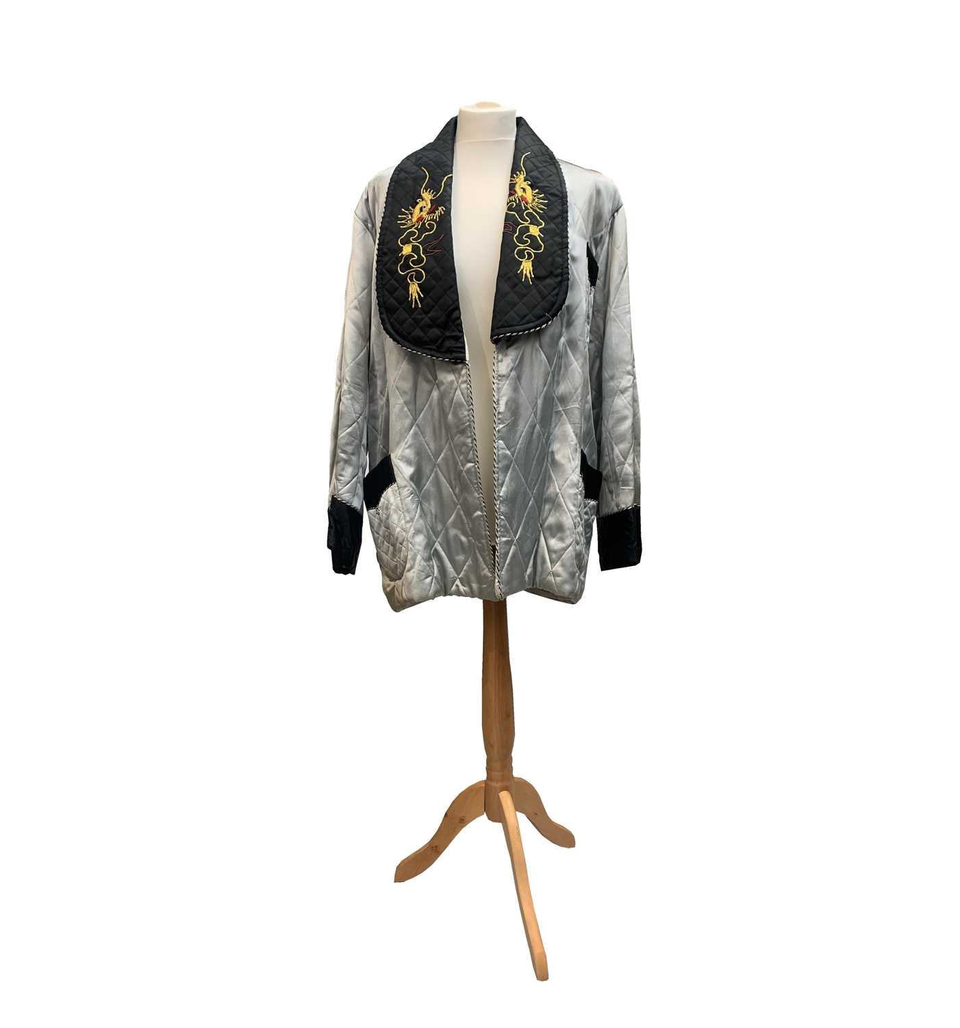 Lot 238 A Chinese smoking jacket, 20th century, the