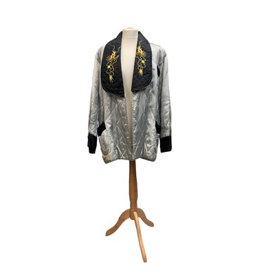 Lot 238 - A Chinese smoking jacket, 20th century, the...
