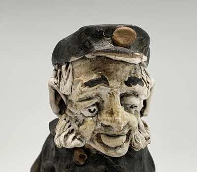 Lot 1061 - A Norman Underhill pottery figure modelled as...