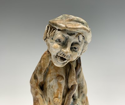 Lot 1061 - A Norman Underhill pottery figure modelled as...