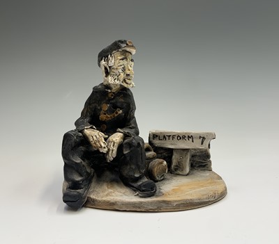 Lot 1061 - A Norman Underhill pottery figure modelled as...