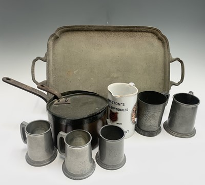 Lot 588 - A copper saucepan with lid, five pewter...