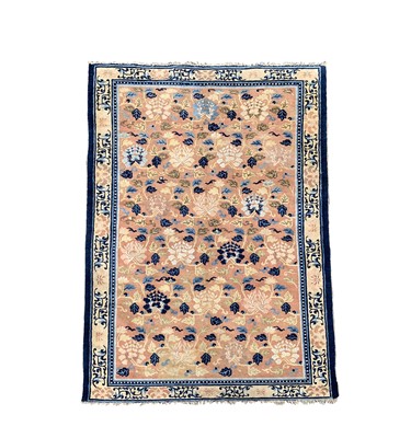 Lot 1228 - A Chinese carpet, 19th century, the camel...