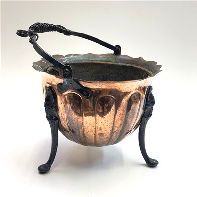 Lot 221 - An Art Nouveau period copper fire basket with...