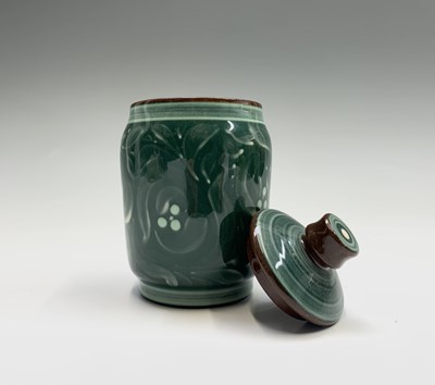 Lot 1072 - A Lamorna Pottery green glazed lidded pot,...