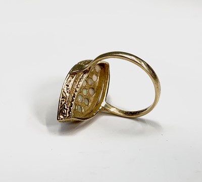 Lot 165 - An 18ct gold navette ring, pave set with opals...