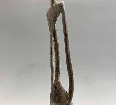 Lot 363 - An African bronze figure of elongated form,...