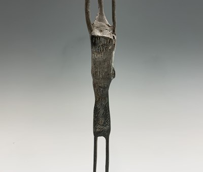 Lot 363 - An African bronze figure of elongated form,...