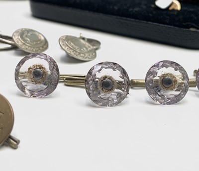 Lot 72 - Five amethyst buttons, a pair of silver...