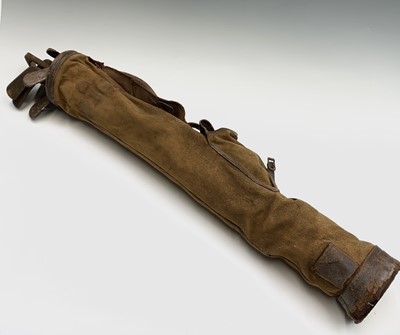 Lot 477 - A 1920s leather golf bag, containing twelve...