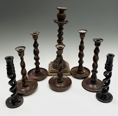 Lot 383 - Three pairs of barley twist stem candlesticks,...