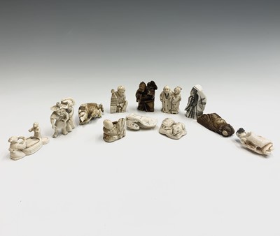 Lot 193 - Twelve Japanese Netsukes, mainly ivory, early...