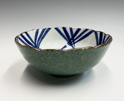 Lot 254 - A Japanese Arita style blue and white...