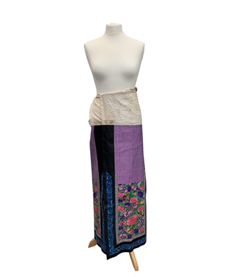 Lot 257 - A Chinese silk embroidered wrap-around skirt,...