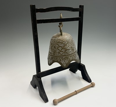 Lot 274 - A Chinese brass bell shape gong on ebonised...